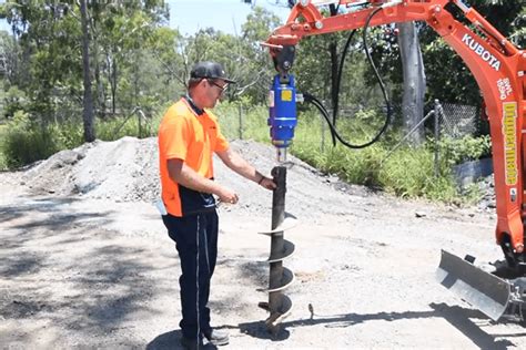 mini excavator post hole digger|mini excavator post hole auger.